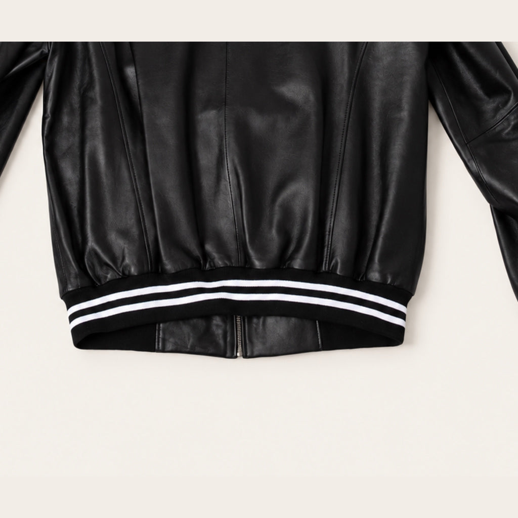 Black Striped Trim Bomber Jacket, ribbed hem and rear seam detail on an ivory studio background.