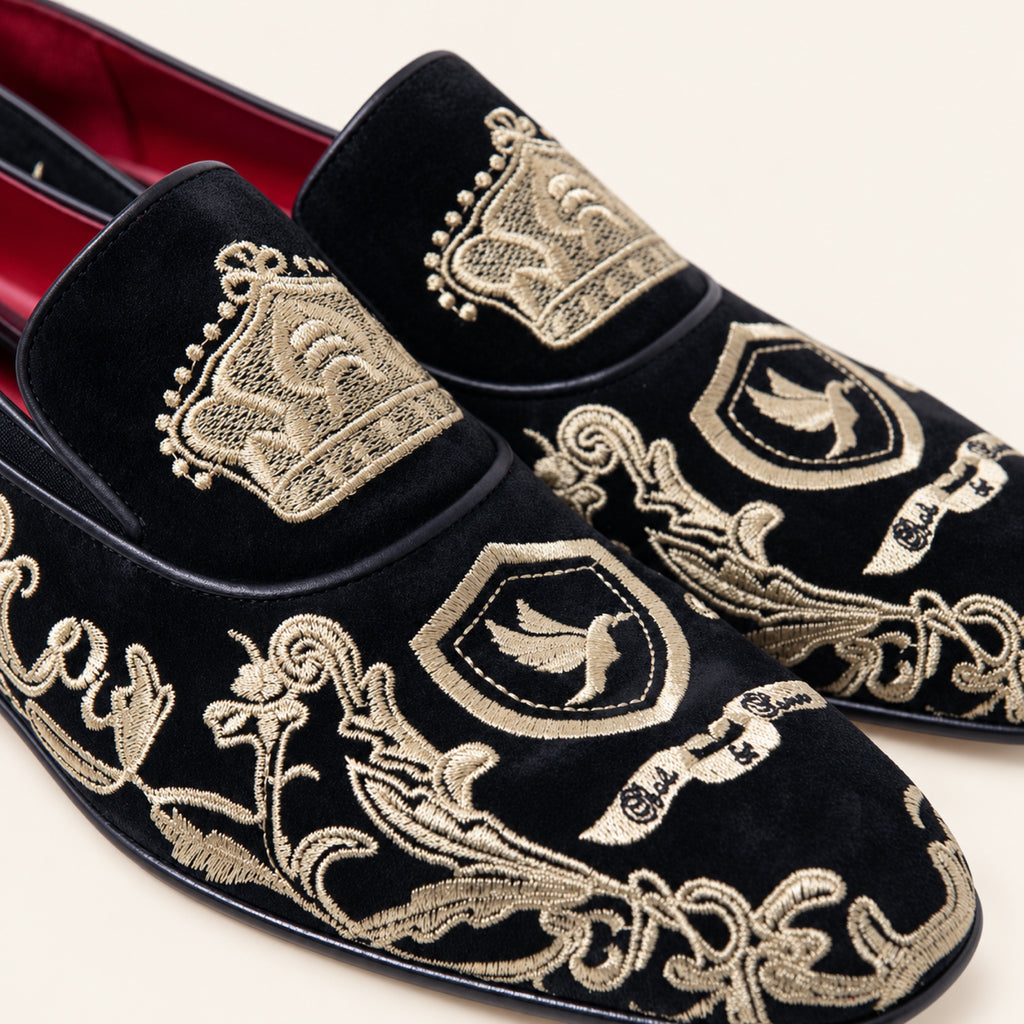 The Sultan Embroidered Loafer — Black & Gold, close-up detail on an ivory studio background.
