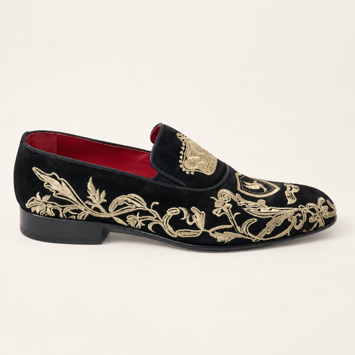 The Sultan Embroidered Loafer — Black & Gold, side profile on an ivory studio background.