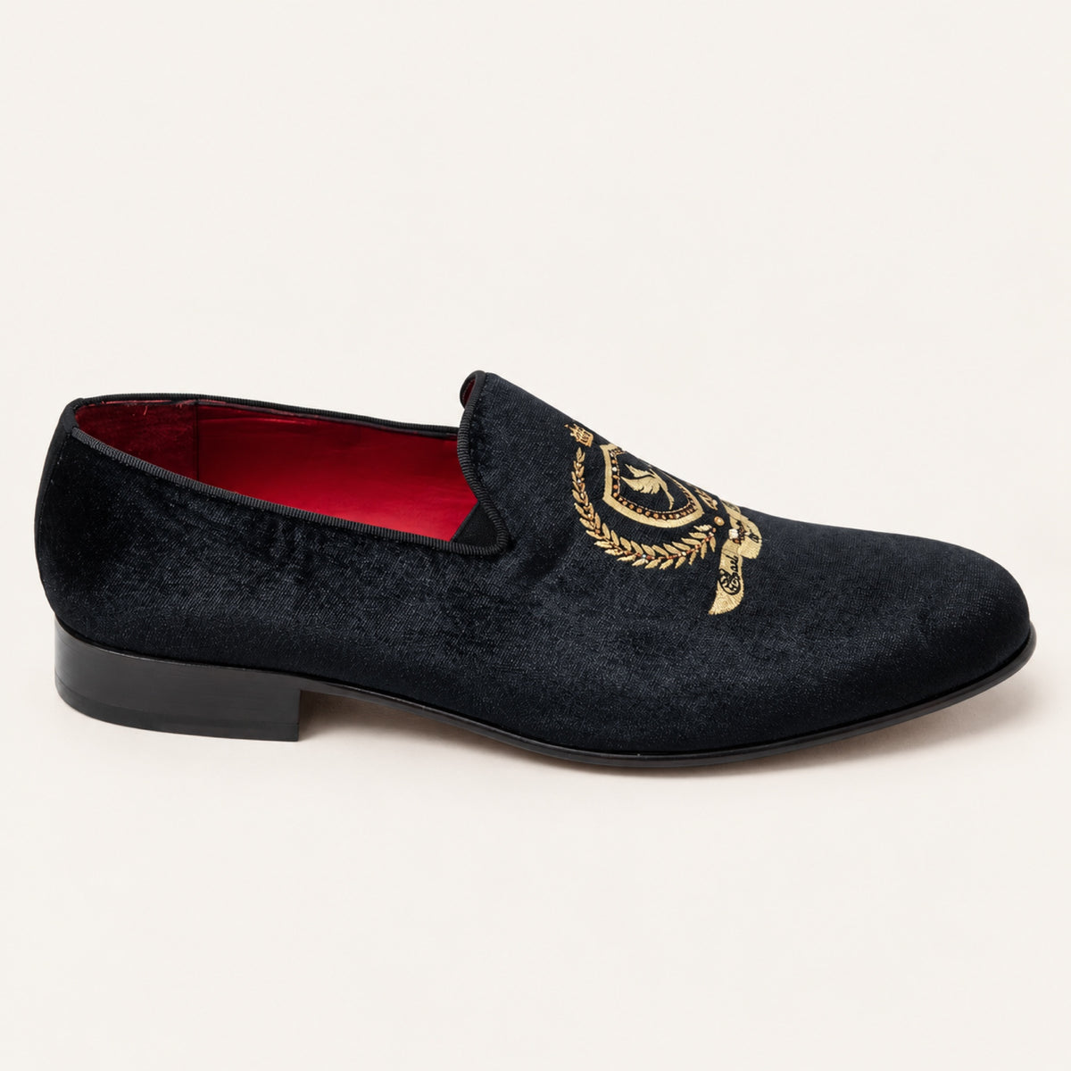 The Sultan Embroidered Loafer — Black, side profile on an ivory studio background.